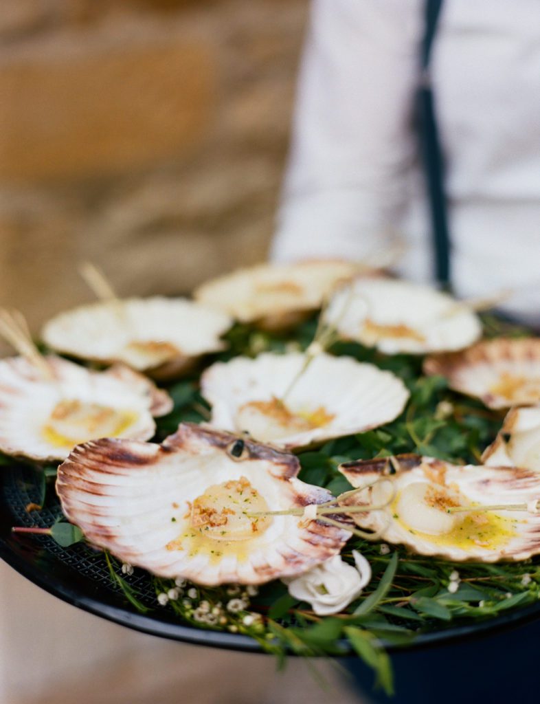 Luxury wedding canapés served on scallops